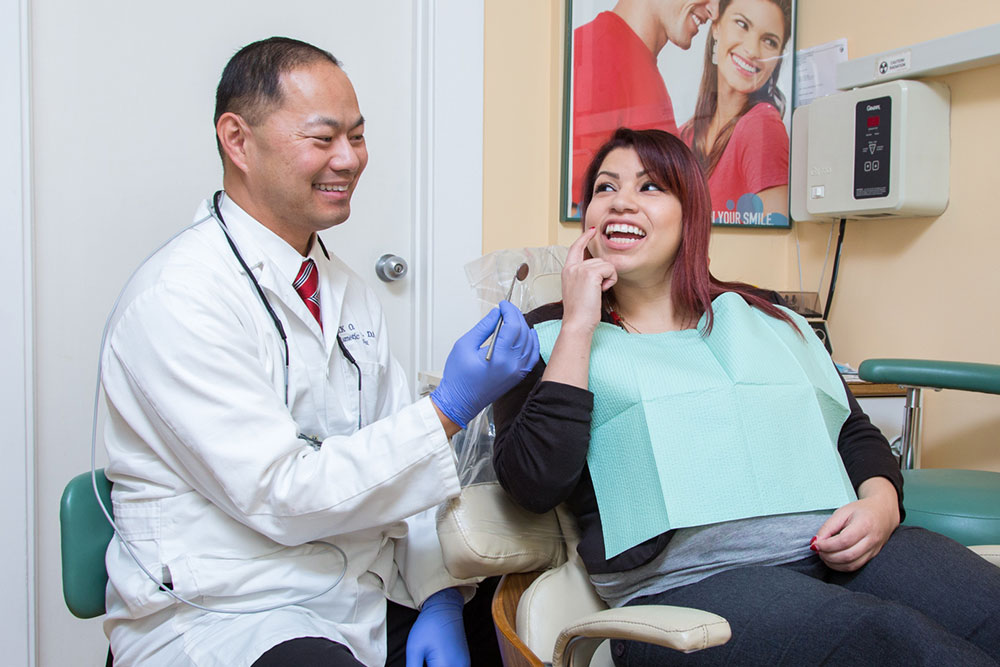 Derrick Chua with patient